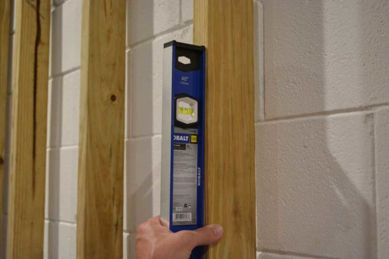 How To Build A Wall In A Garage Over Concrete Block [DIY Guide With Photos]