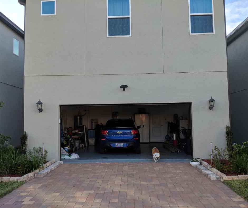 Attached garage with living space above it