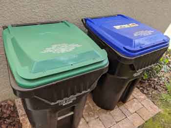 Trash cans outside garage - Feature Image
