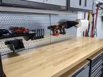 Wall Control pegboard over Gladiator workbench - Feature Image