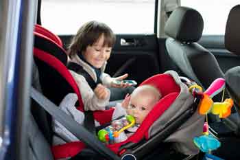 Children in car seats - Feature Image