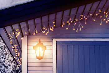 Christmas lights outside garage door - Feature Image