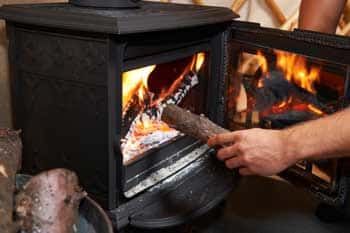 Wood burning stove in garage - Feature Image