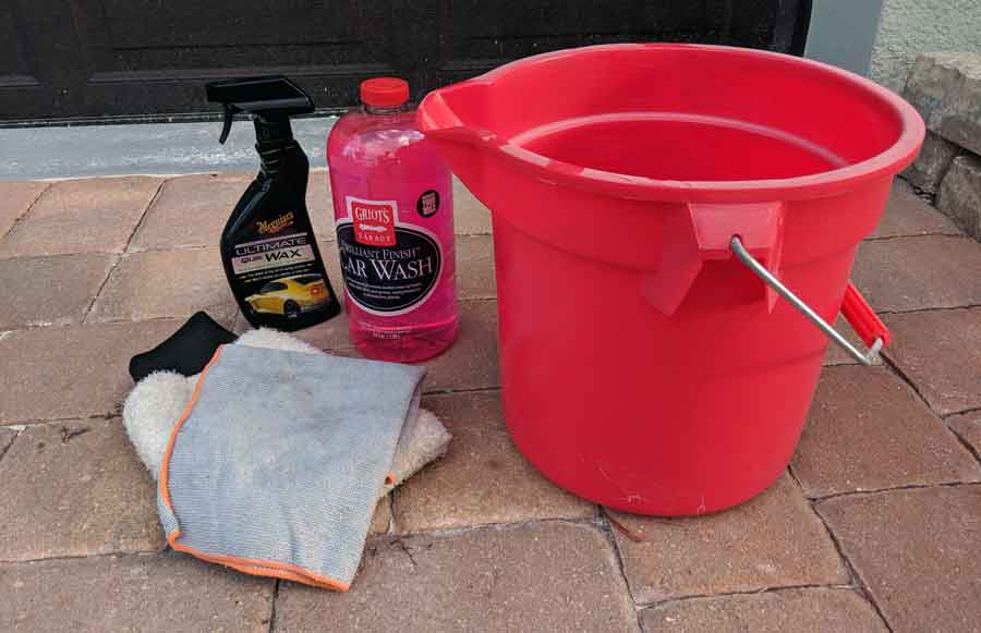 You can use the same supplies to wash your car and your garage door