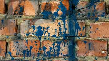 Paint splatter on brick - Feature Image
