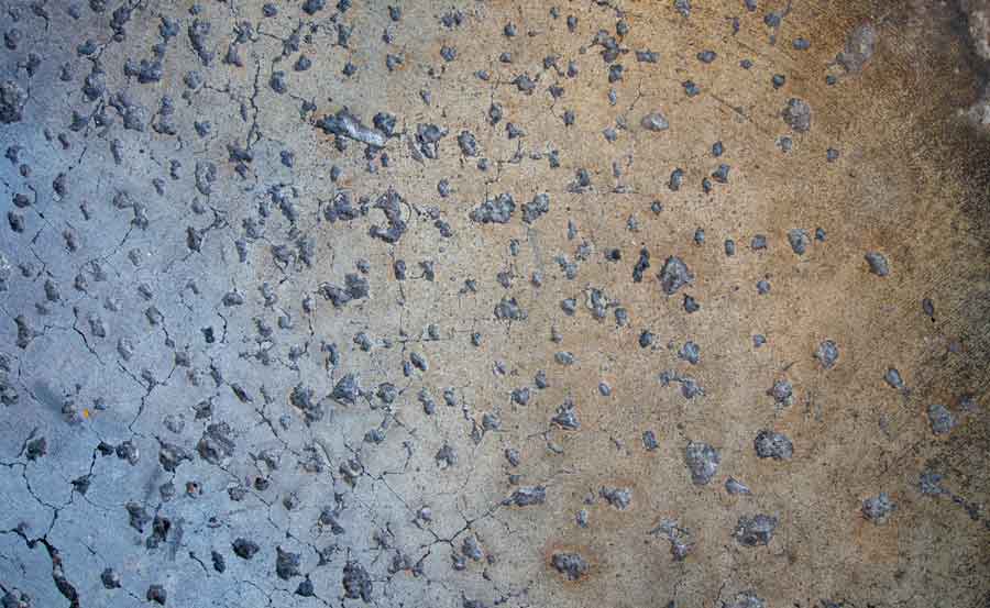 Pitted concrete floor