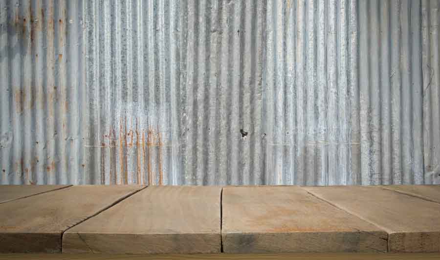 Corrugated metal wall with wood floor