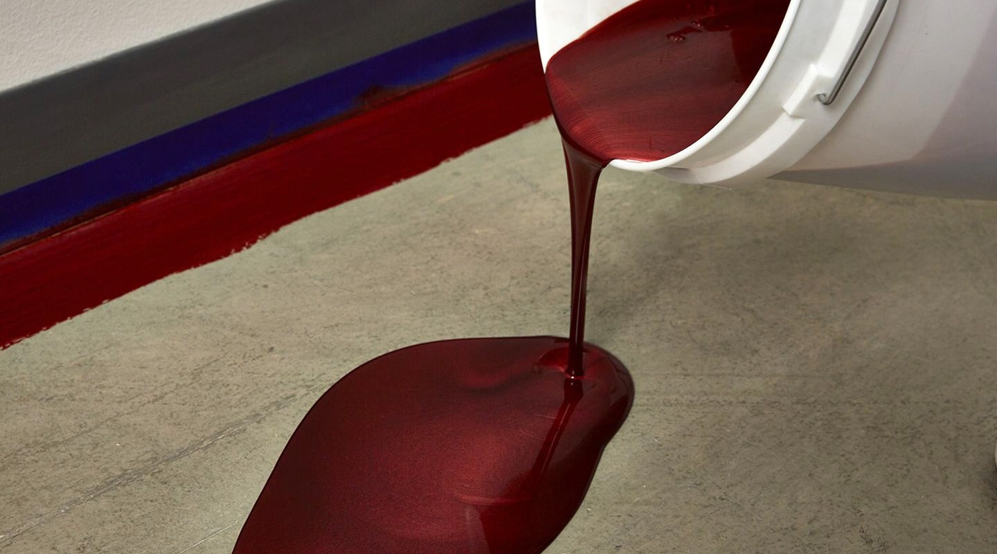 Pouring red metallic polycuramine floor coating
