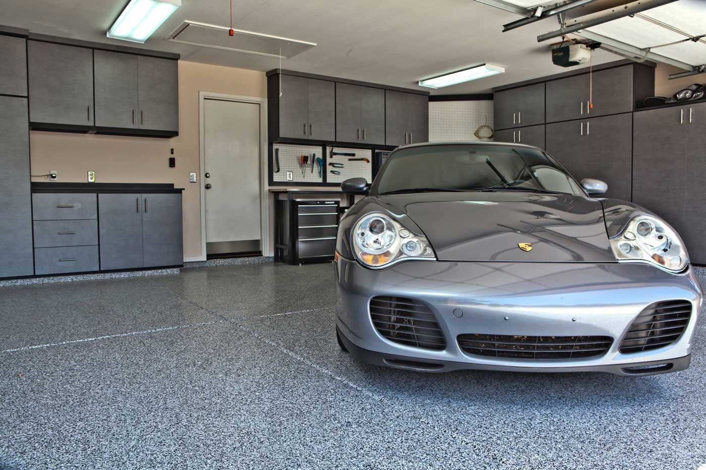 Porsche 911 in a matching grey garage