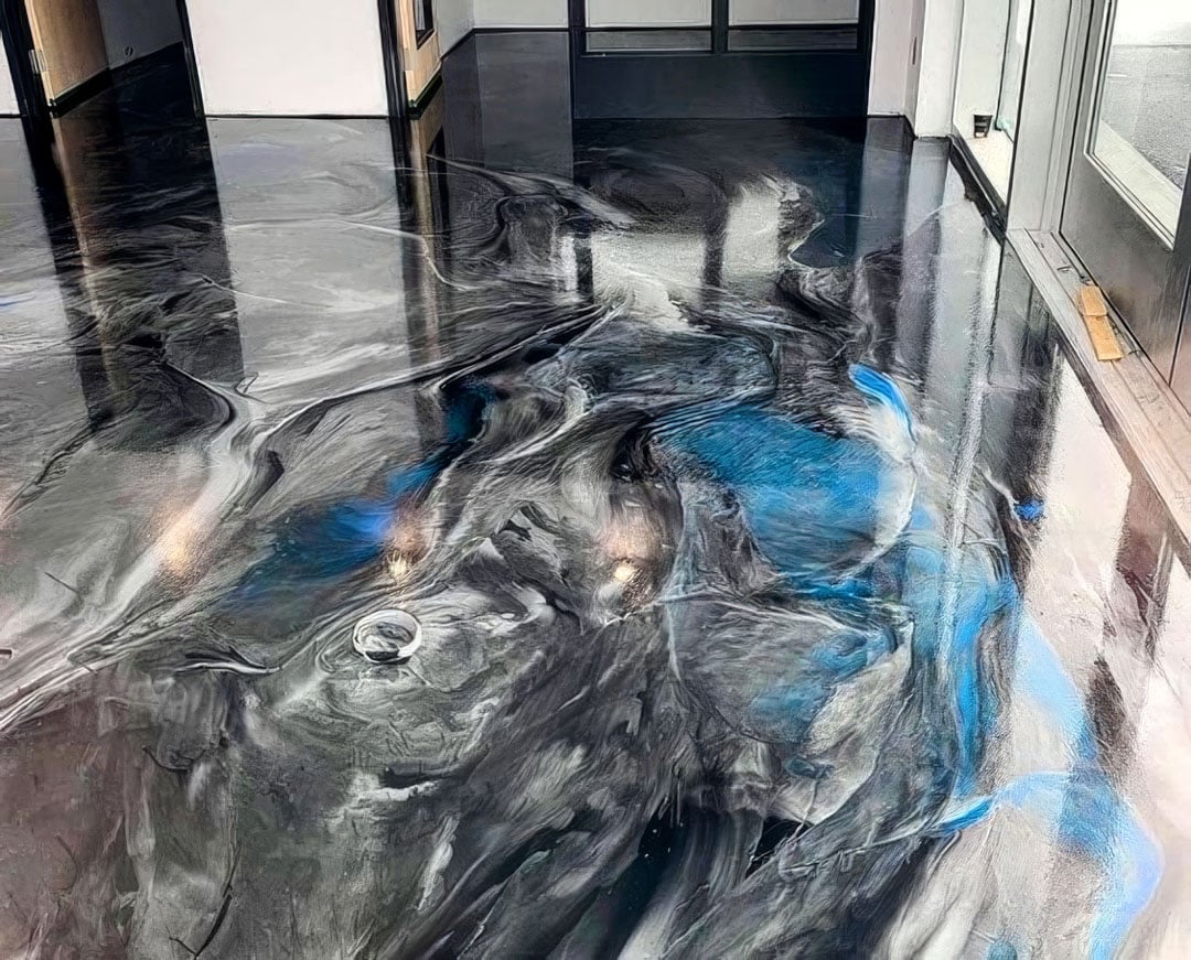 Black, blue, & silver swirl epoxy floor