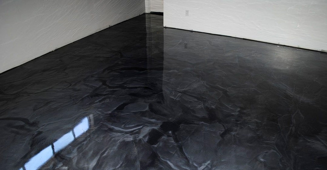 Deep black swirl epoxy floor
