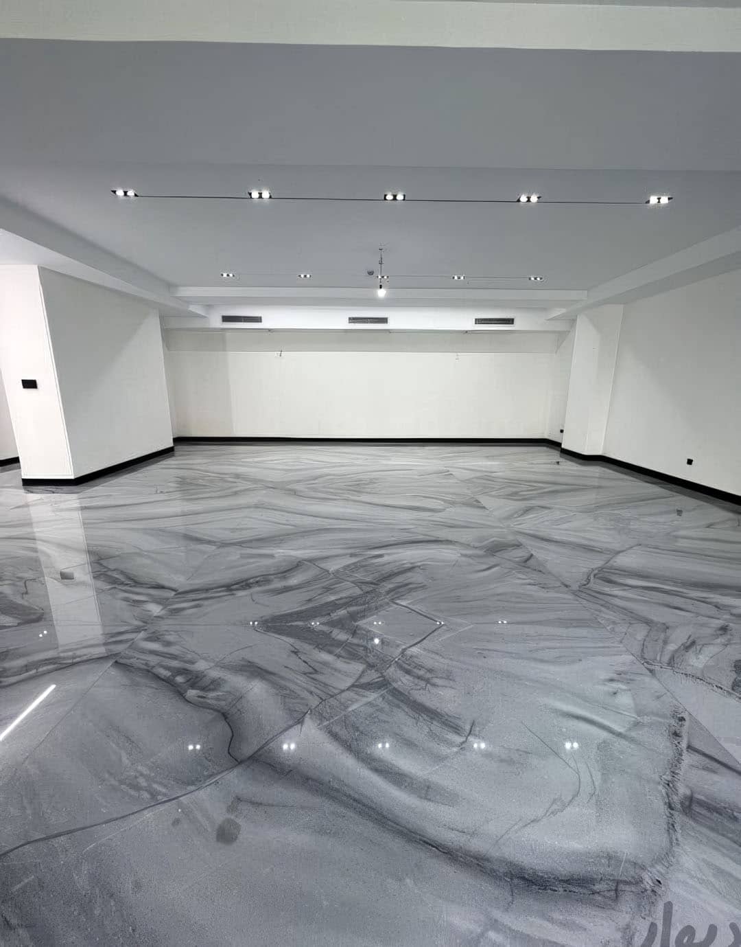 Grey & silver swirl epoxy floor