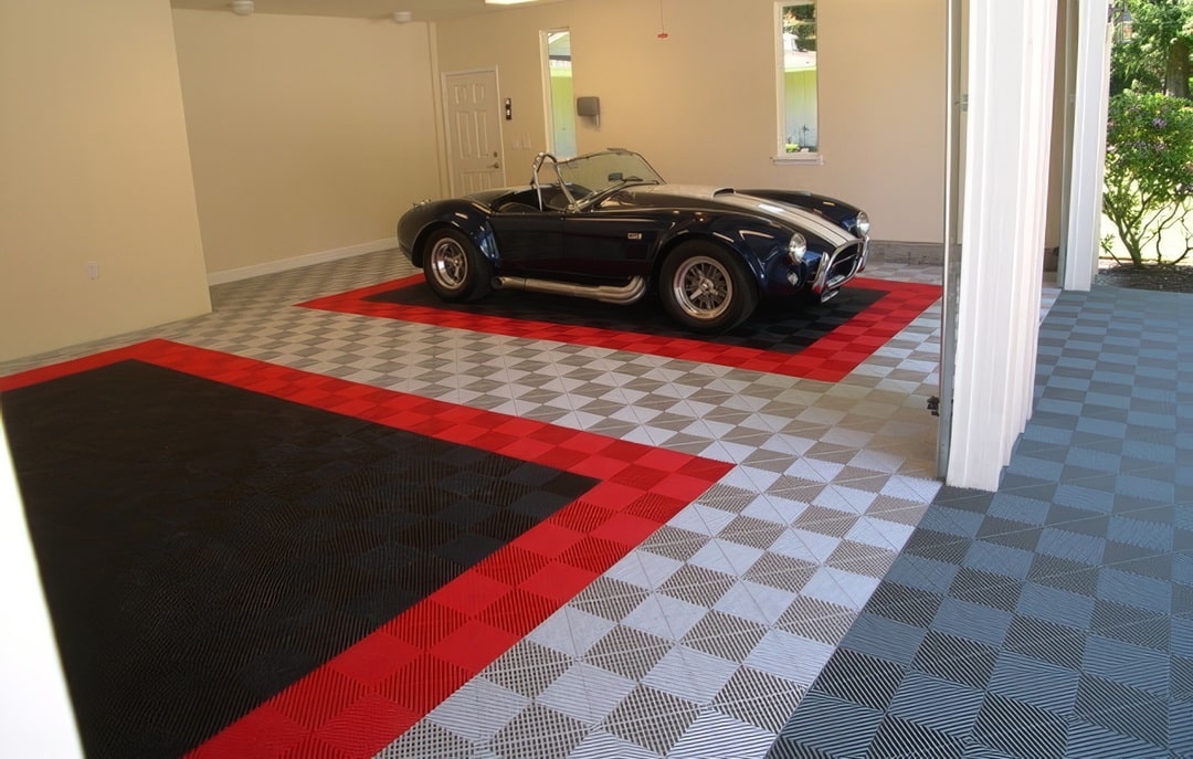 Black, red, & silver tile floor parking spaces