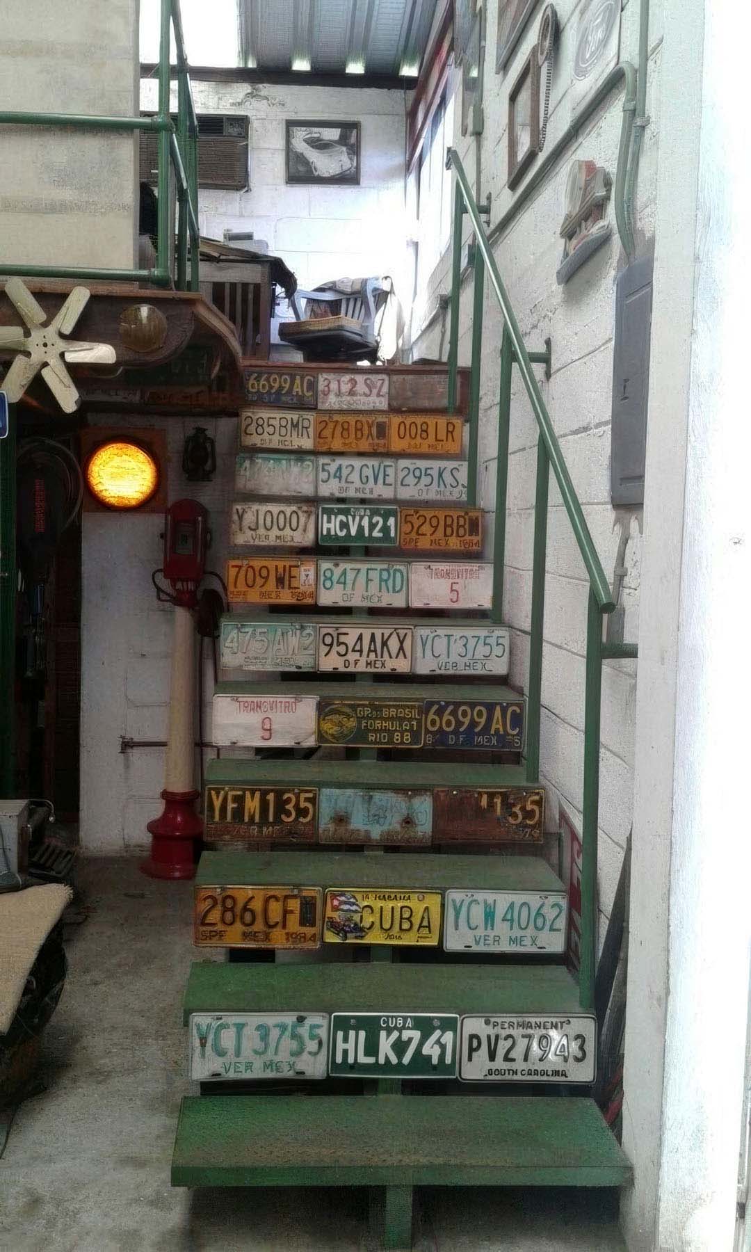 Vintage license plates on stairs