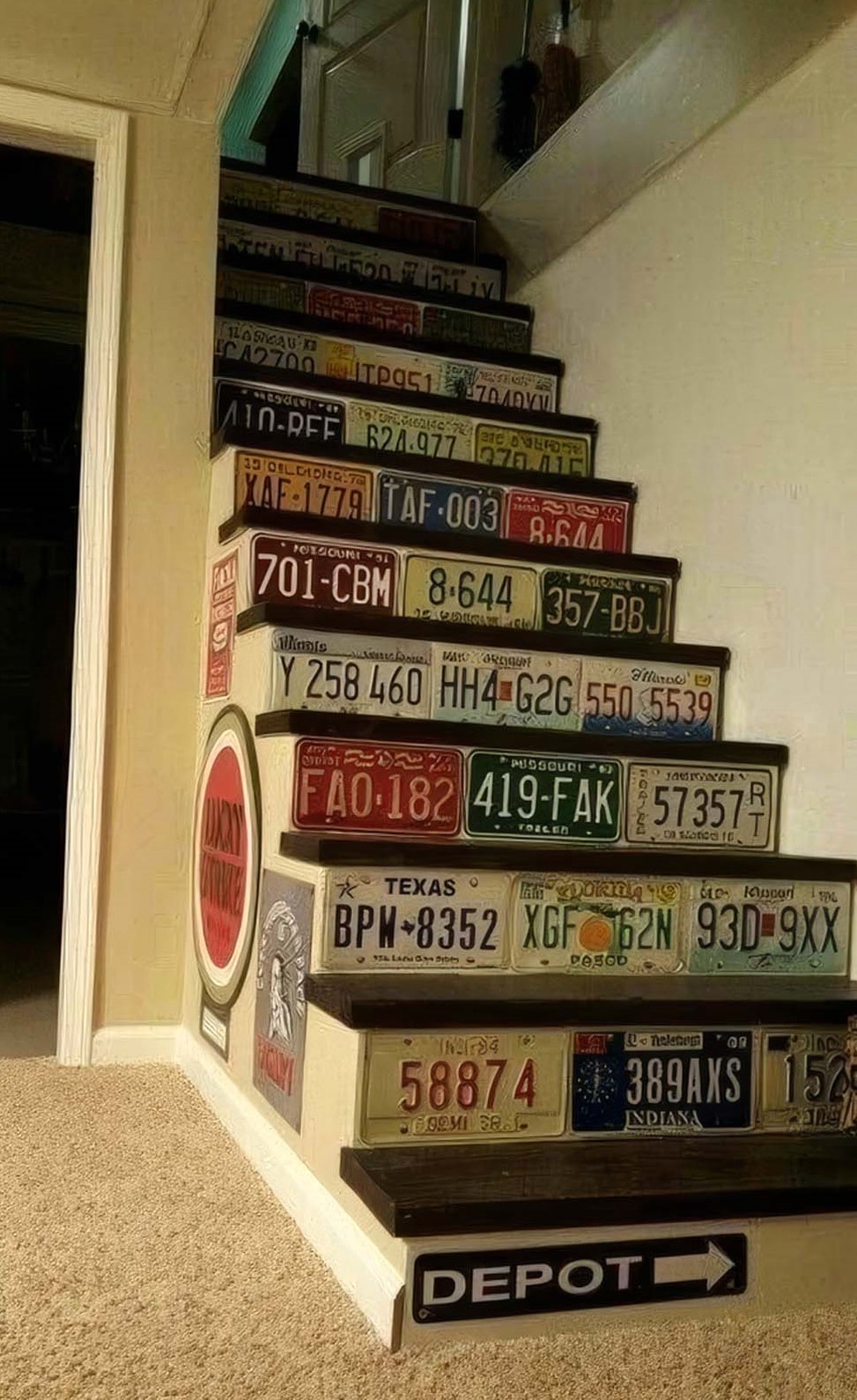 License plates decorating stairs to basement