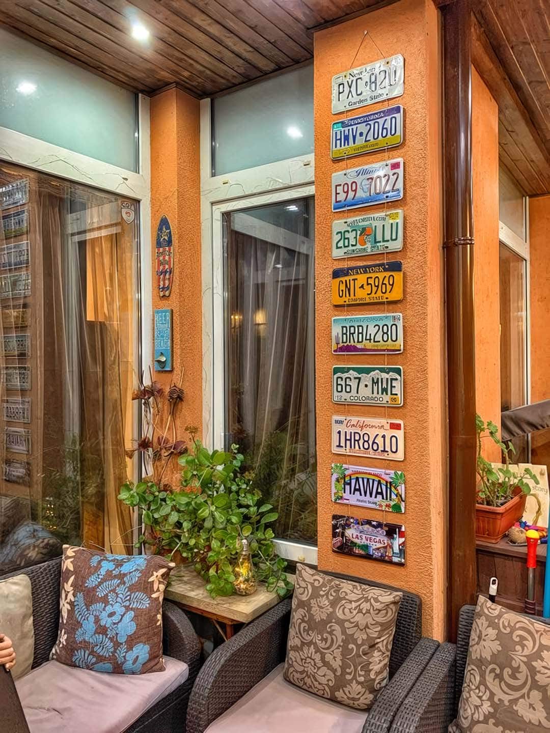 License plates hanging on living room wall