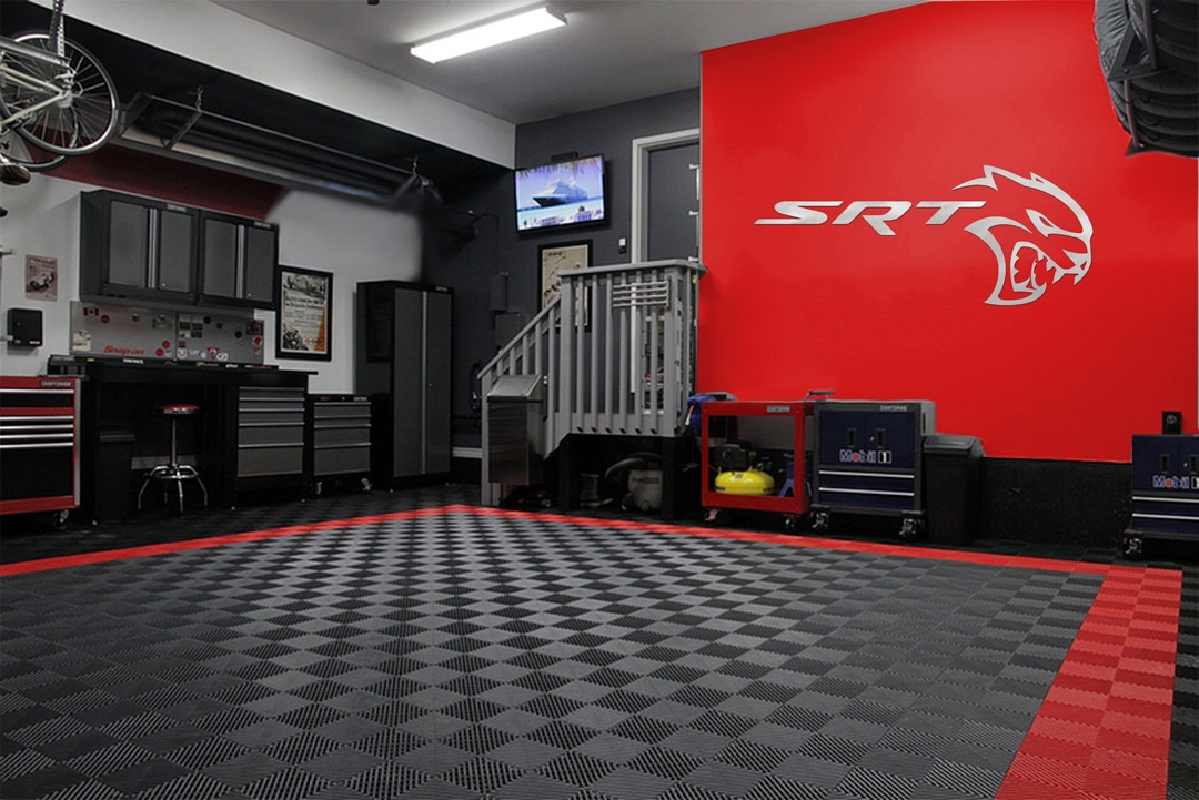 Garage with red accent wall and SRT logo