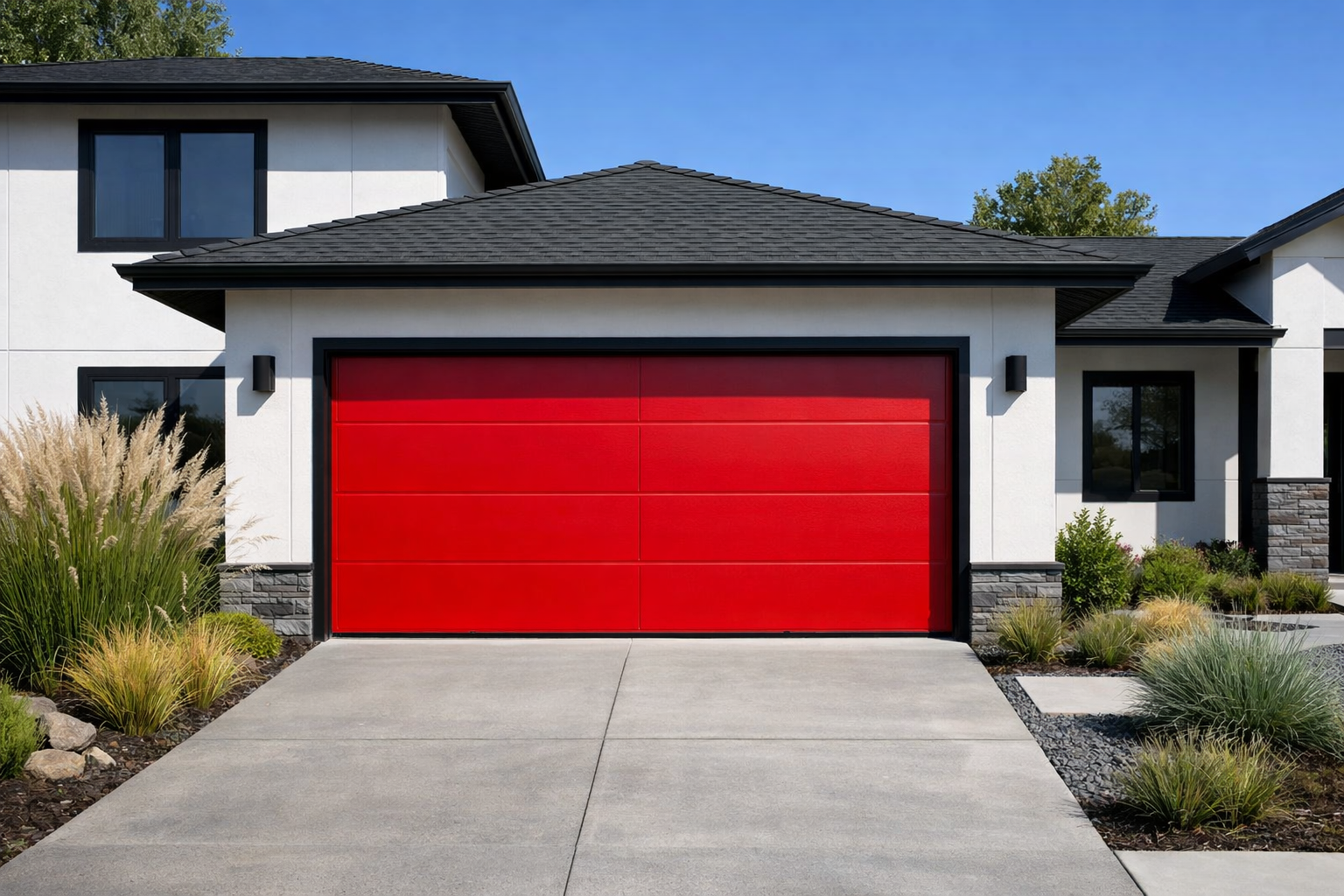Contemporary home with striking bright red garage door and white exterior