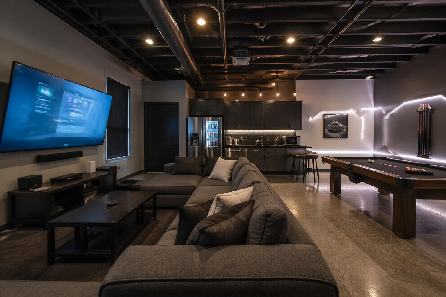 Modern teen garage hangout with gaming area and pool table