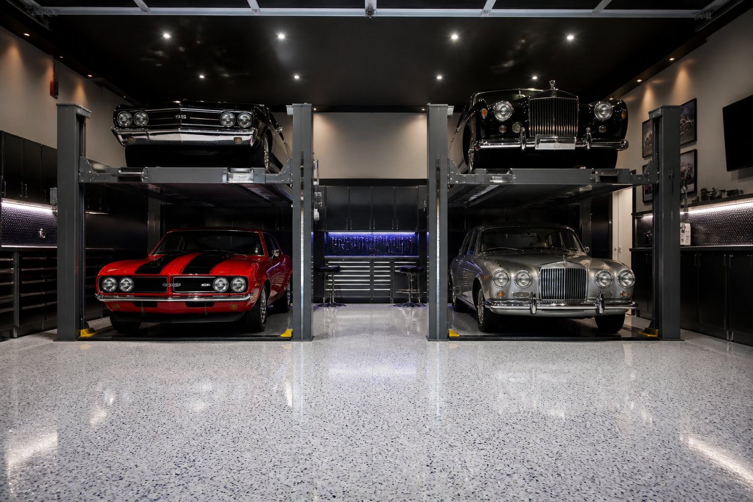 Side-by-side double-stacker lifts storing four classic cars in wide two-car garage space