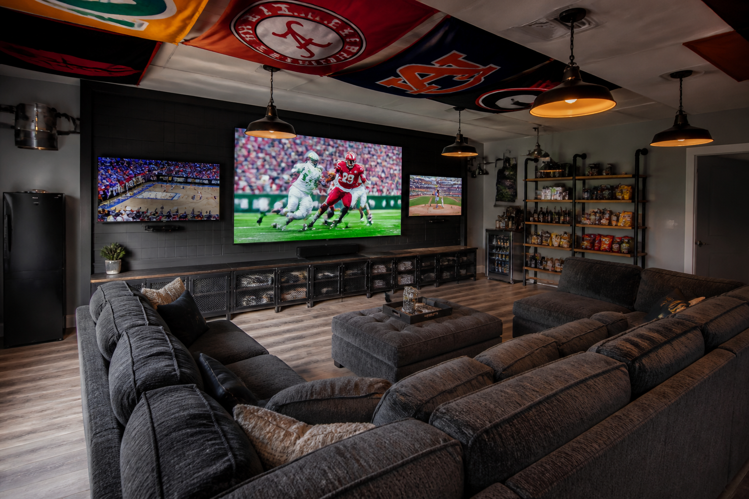 Multi-screen garage sports viewing setup with three televisions showing simultaneous games