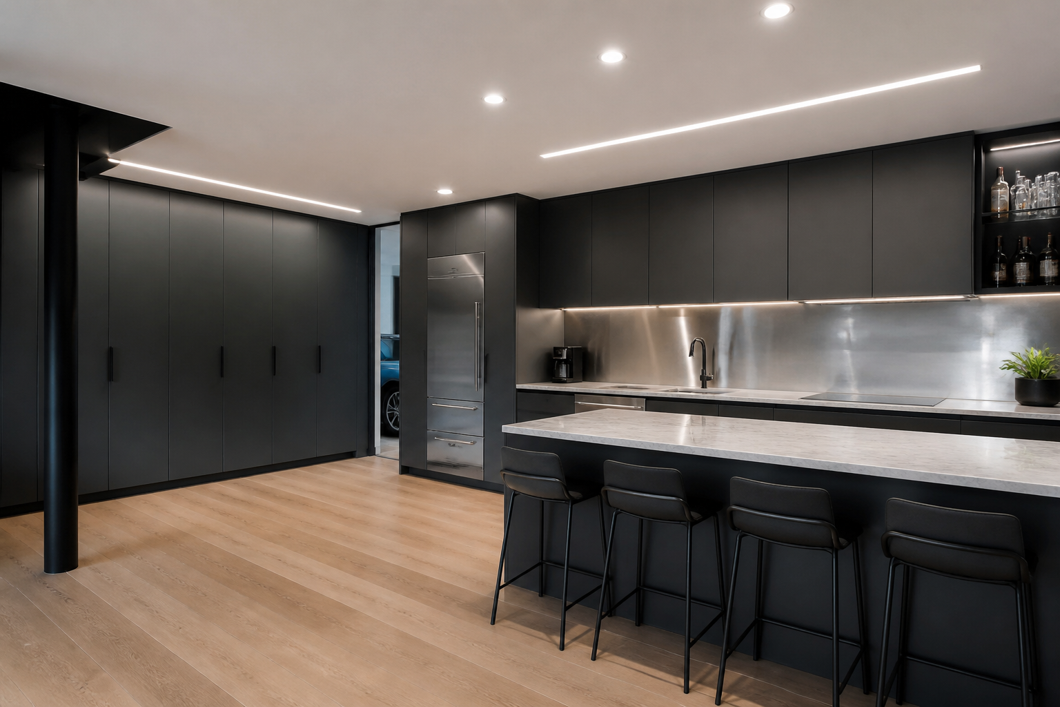 Premium charcoal garage kitchen with marble counters and stainless backsplash