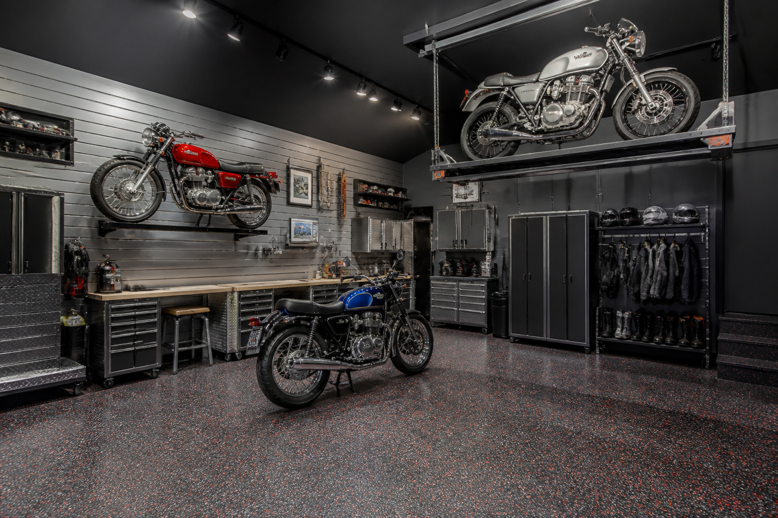 Three motorcycles stored at different heights using wall mount, floor space, and ceiling lift