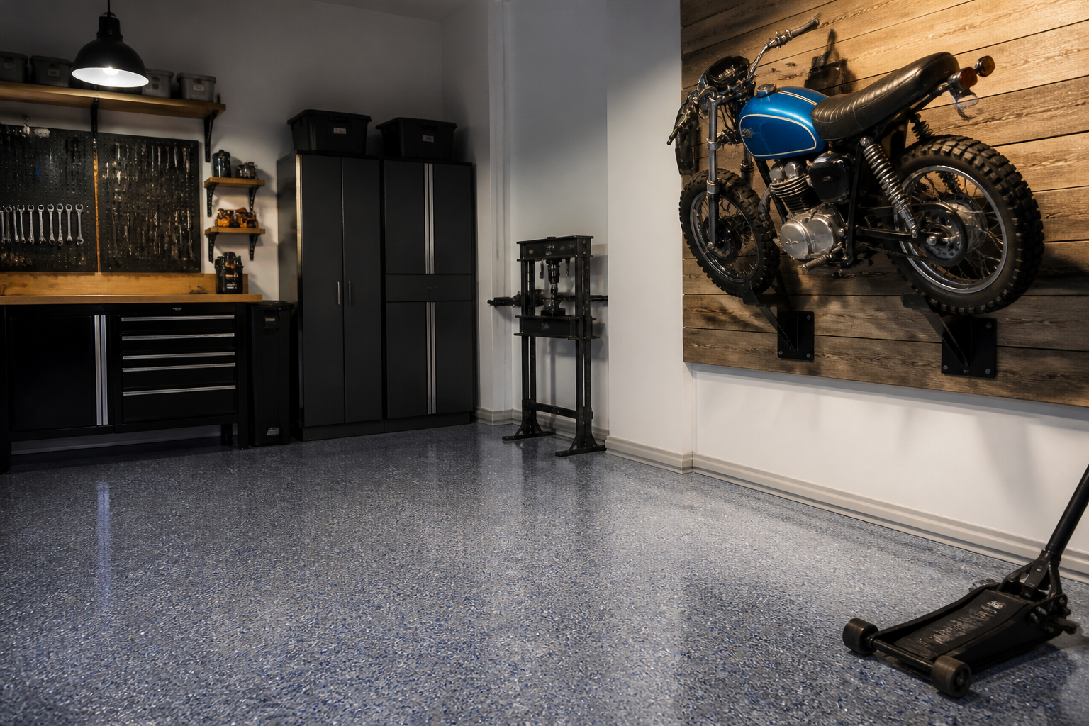 Blue vintage motorcycle mounted at angle on white wall with industrial brackets and wood accent