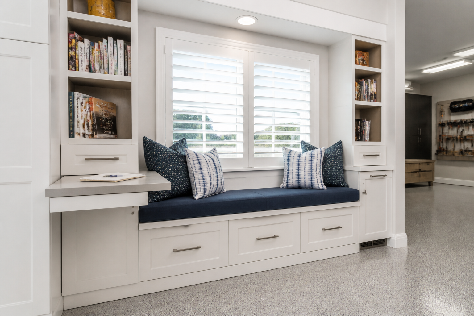 Window seat with storage and cookbook cubbies in garage pantry nook