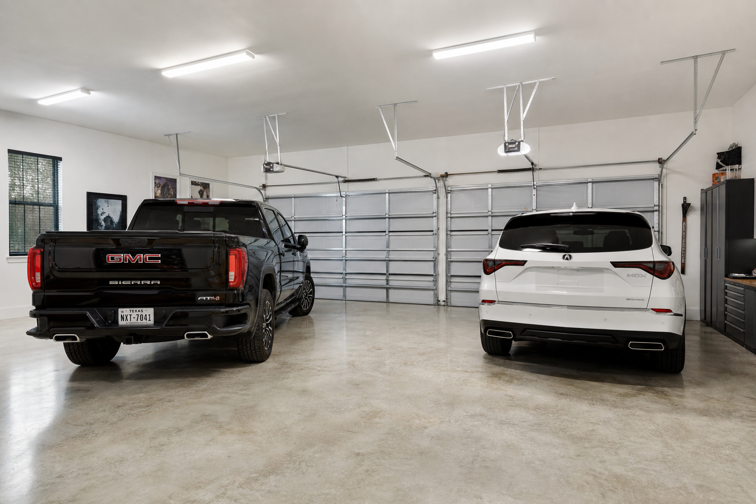 Interior of garage showing pickup truck and SUV with proper clearance spacing