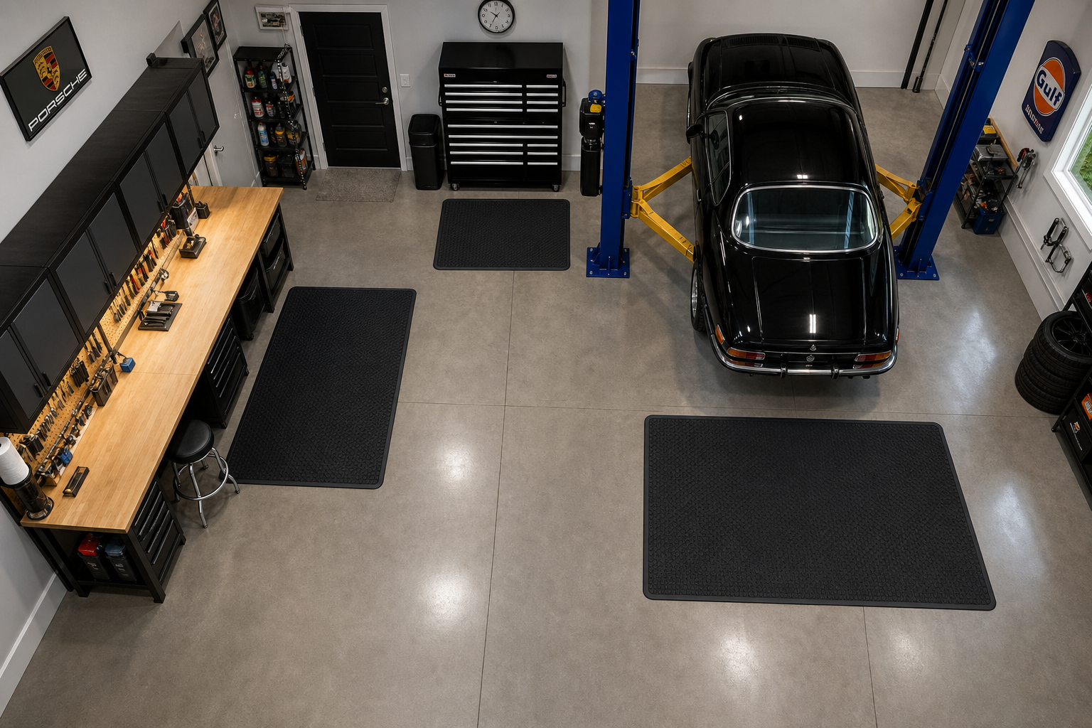 Garage workshop layout showing strategic placement of anti-fatigue mats in work areas