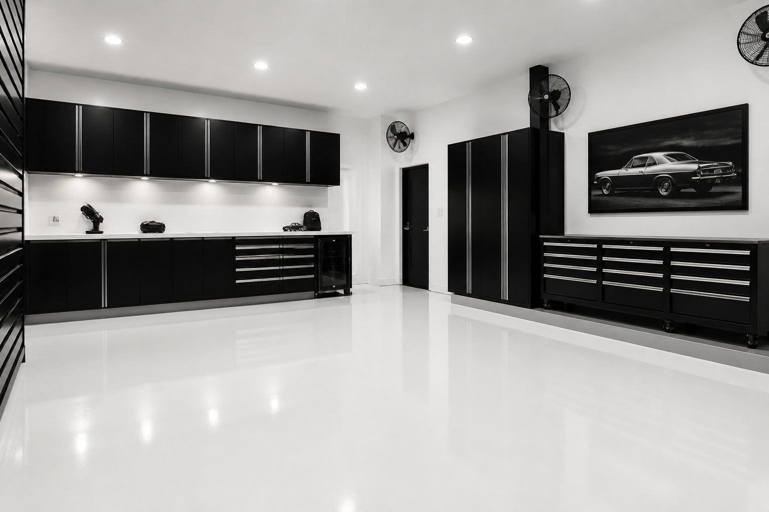 High-contrast minimalist garage with black cabinets and white walls