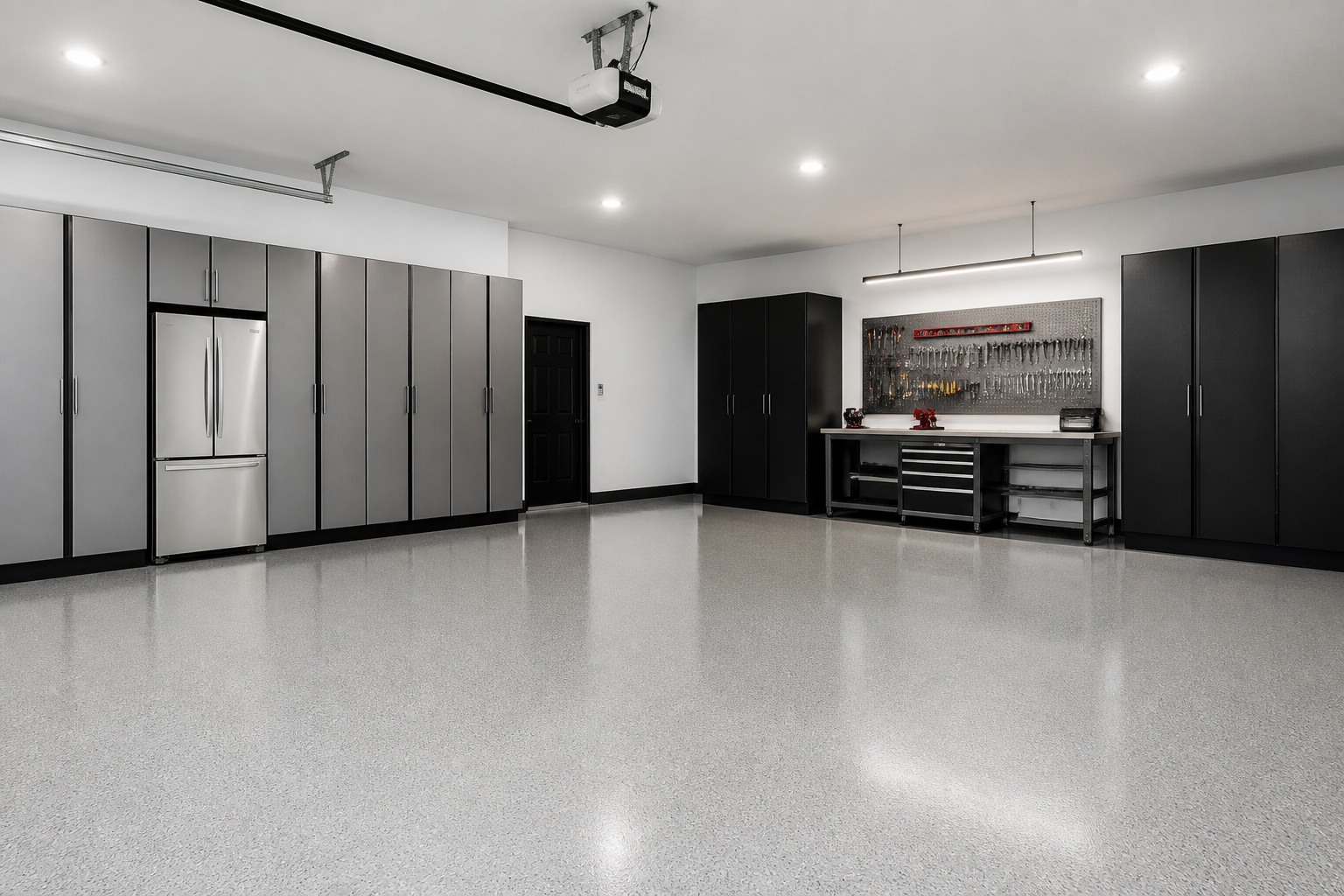Defined work zone with workbench in corner of minimalist garage layout