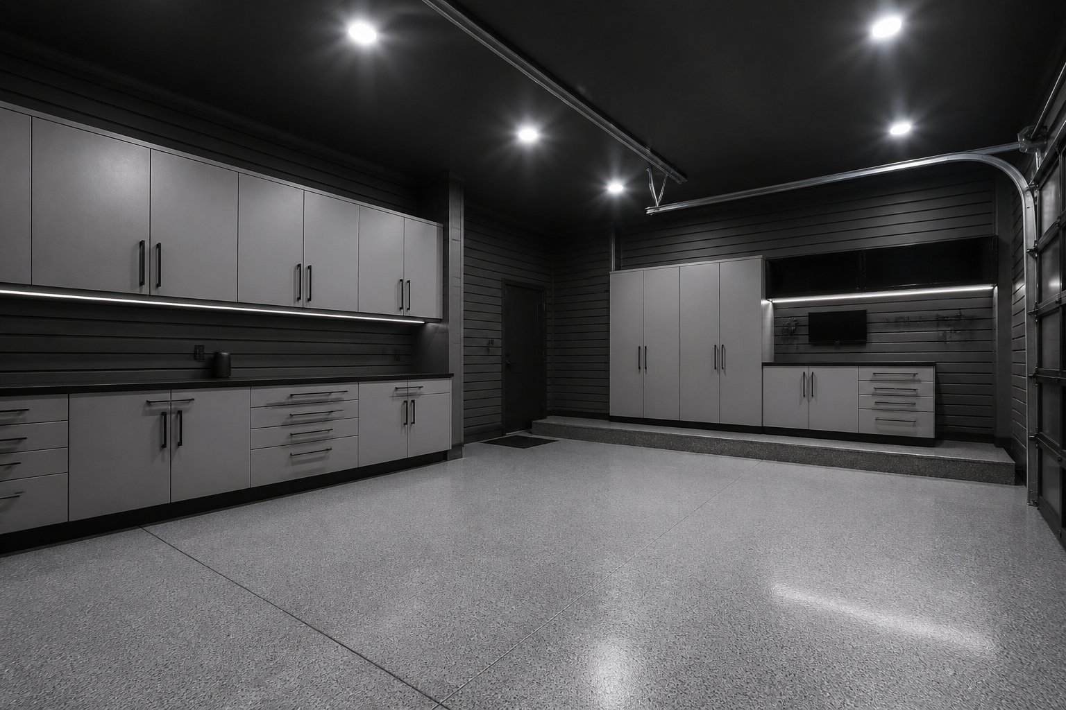 Gray-toned minimalist garage with charcoal walls and varied gray storage