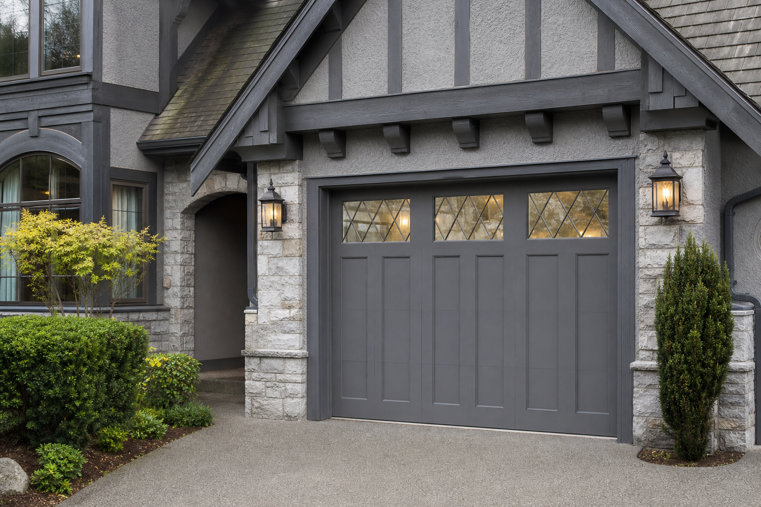 Tudor-style home with single-car garage door featuring diamond leaded glass window inserts