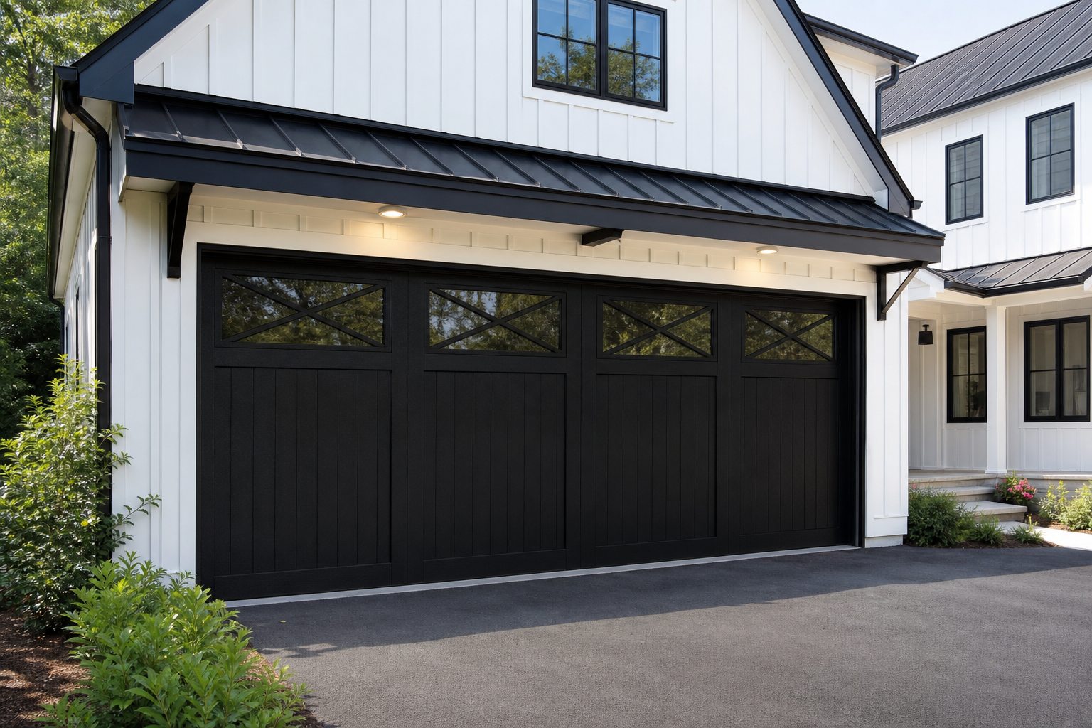 Black farmhouse garage door with X-pattern decorative grille window inserts