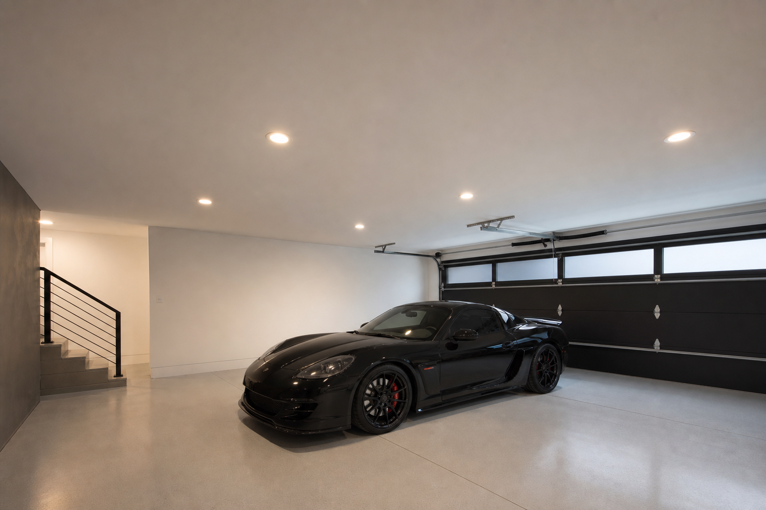 Recessed LED can lights in a grid pattern on a finished drywalled garage ceiling