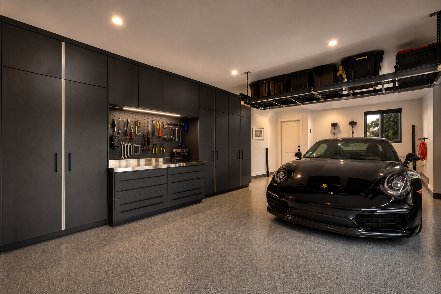 Single car garage with full wall cabinets workbench and overhead ceiling storage rack