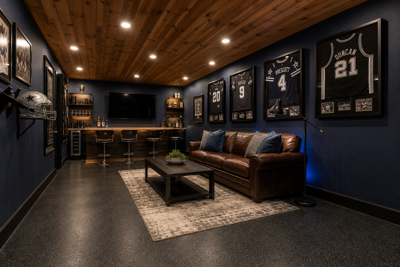 Luxury garage man cave renovation with navy walls, wood plank ceiling, epoxy floor, bar, and TV