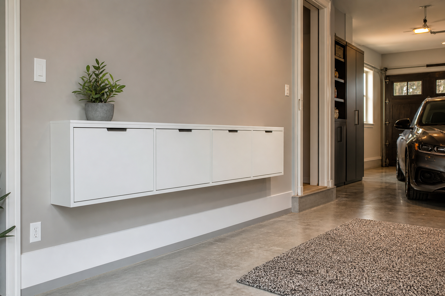 White wall-mounted modular flip-down shoe cabinet in a modern Scandinavian-style garage entry