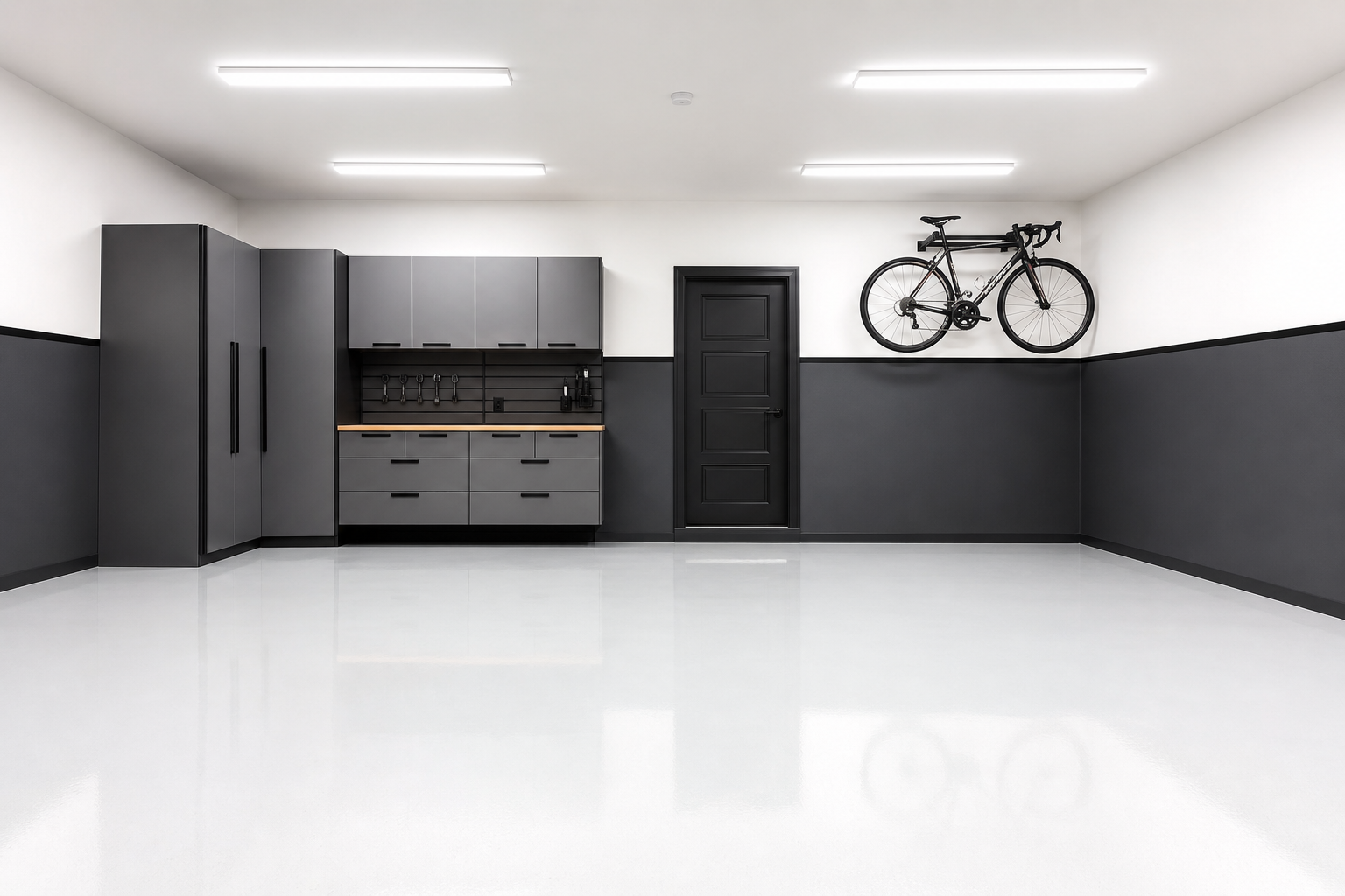 Two-tone garage with charcoal lower walls, white upper walls, and glossy white floor coating